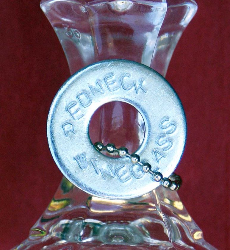 Close up of engraved washer on chain (removable)