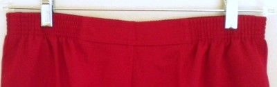 True red pair of pants ~ Elastic around the backside of the waistband 