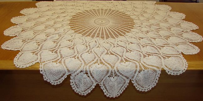 Nicely made, crocheted round tablecloth. Condition is very good with 